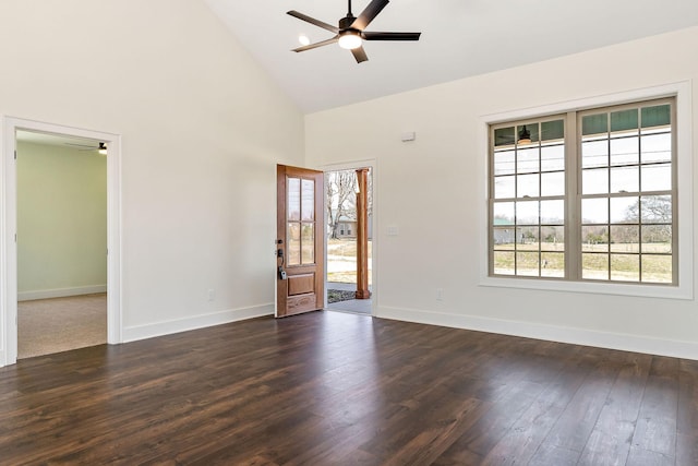 empty room featuring ceiling fan, high vaulted ceiling, and dark hardwood / wood-style flooring