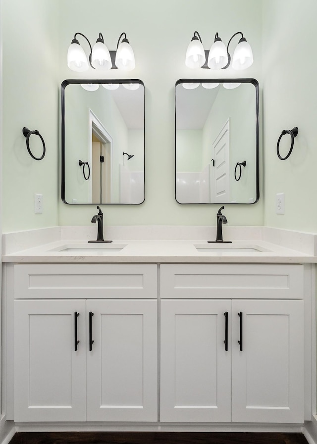 bathroom featuring vanity and walk in shower