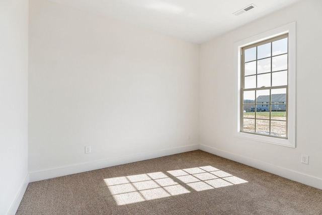 view of carpeted spare room