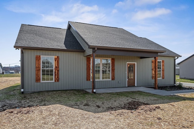 back of property featuring a patio area