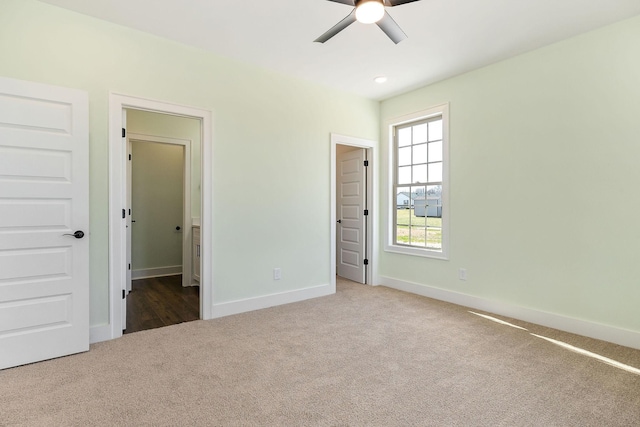 unfurnished bedroom with carpet and ceiling fan