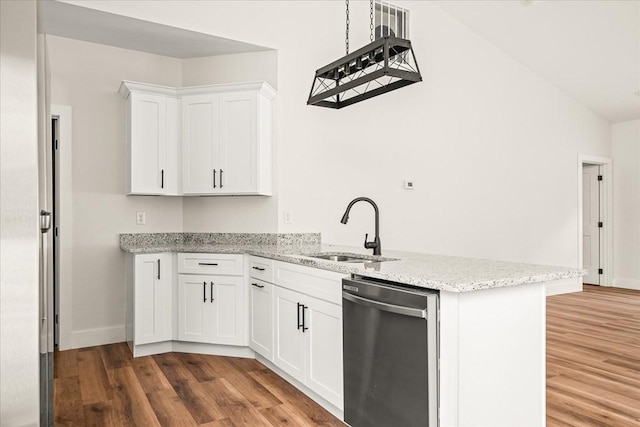 kitchen featuring sink, white cabinets, stainless steel dishwasher, kitchen peninsula, and light stone countertops