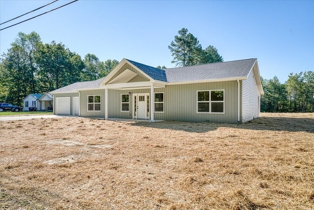 ranch-style home featuring a garage