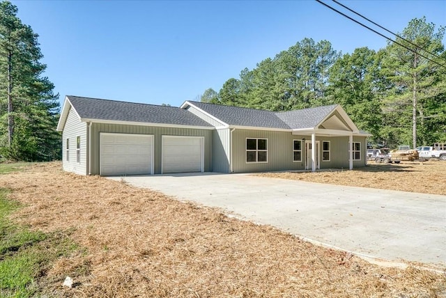 ranch-style home featuring a garage