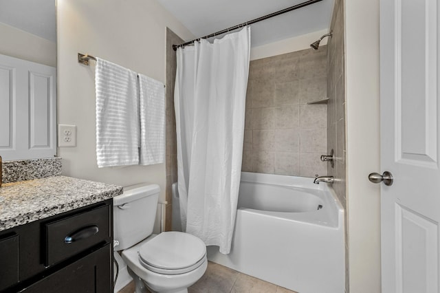 full bathroom with tile patterned flooring, toilet, vanity, and shower / bath combo with shower curtain