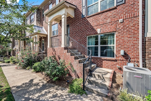 entrance to property with central AC unit