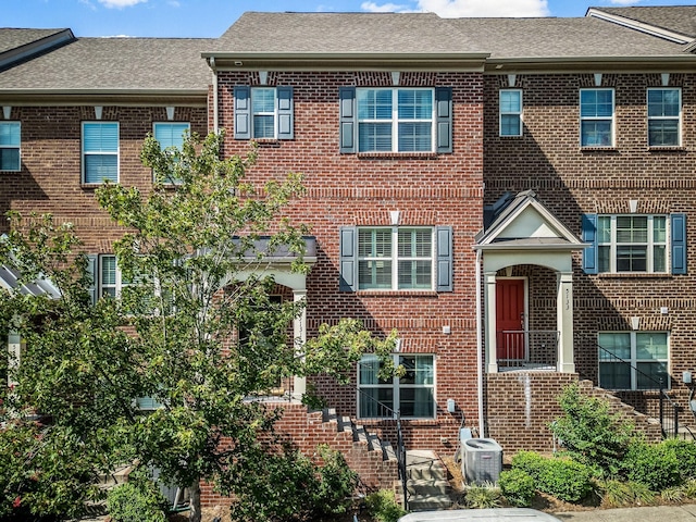 view of front of house featuring central AC unit