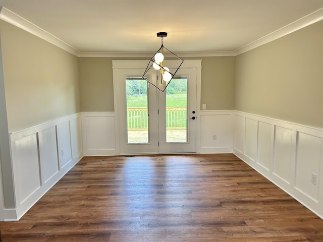 interior space with ornamental molding and dark hardwood / wood-style floors