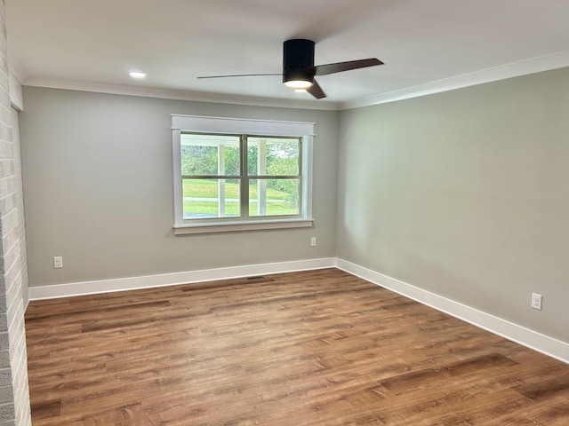 unfurnished room featuring crown molding, ceiling fan, and hardwood / wood-style floors