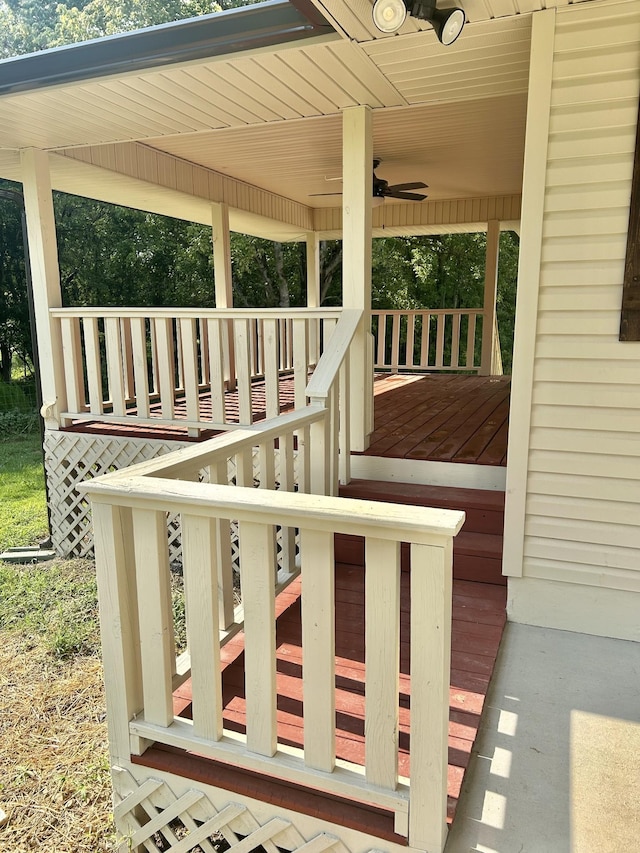 wooden deck with ceiling fan