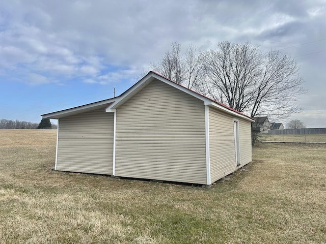 view of outdoor structure featuring a yard