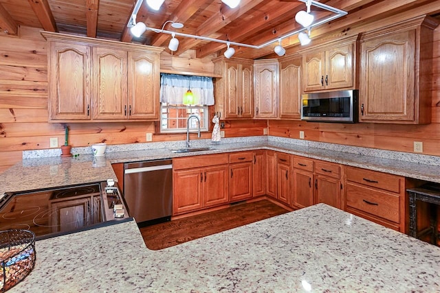 kitchen featuring appliances with stainless steel finishes, sink, wood ceiling, and beam ceiling