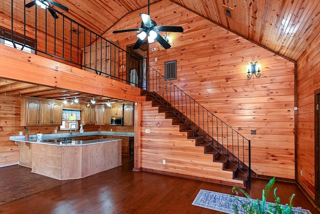 kitchen featuring dark hardwood / wood-style floors, high vaulted ceiling, ceiling fan, kitchen peninsula, and wooden ceiling