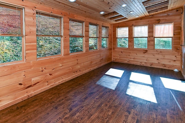 unfurnished sunroom featuring wood ceiling and vaulted ceiling