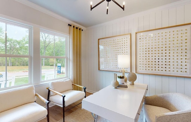 office space with ornamental molding, wood-type flooring, a chandelier, and wood walls