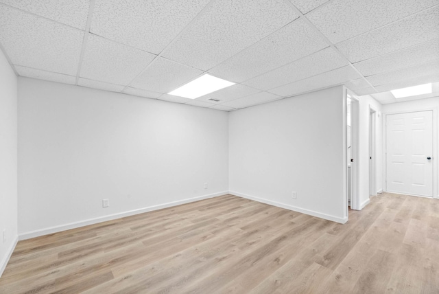 basement featuring light wood-type flooring