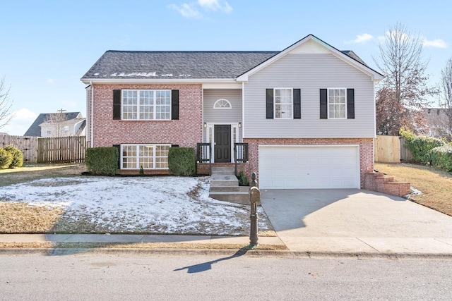 split foyer home featuring a garage