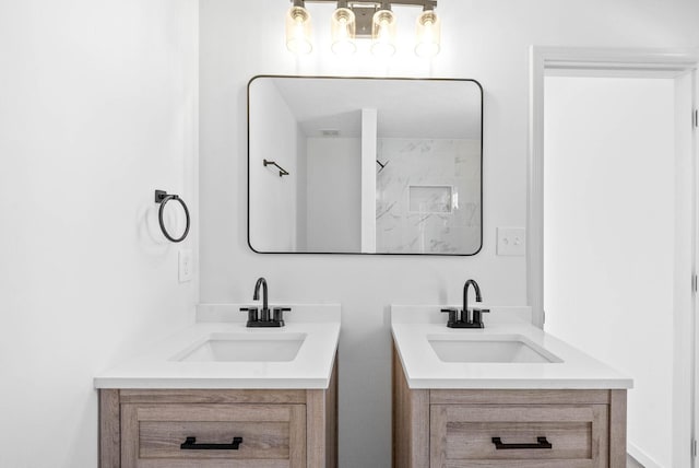 bathroom featuring vanity and walk in shower