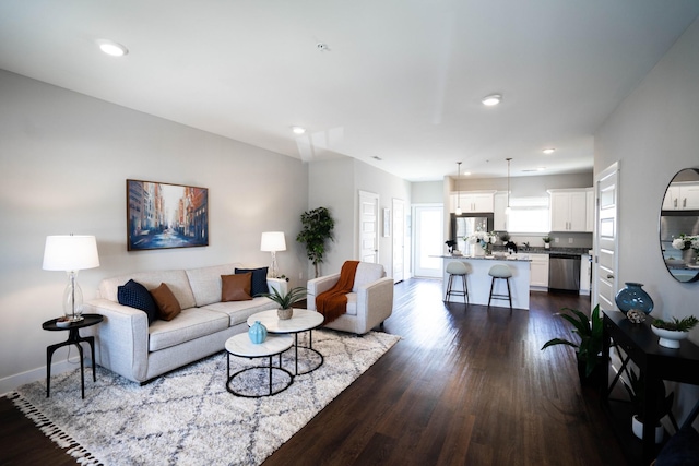 living room with dark hardwood / wood-style floors