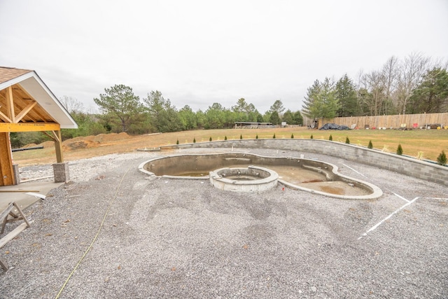 view of patio / terrace featuring a jacuzzi