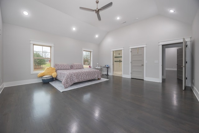 unfurnished bedroom with dark wood-type flooring, high vaulted ceiling, and ceiling fan