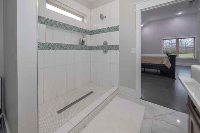 bathroom featuring a tile shower