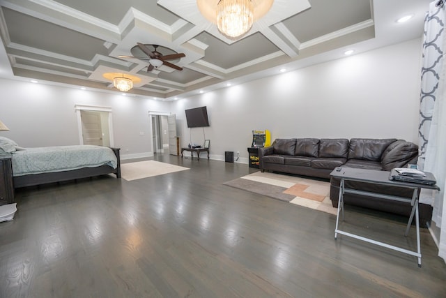 bedroom with dark hardwood / wood-style floors, ornamental molding, coffered ceiling, and ceiling fan with notable chandelier