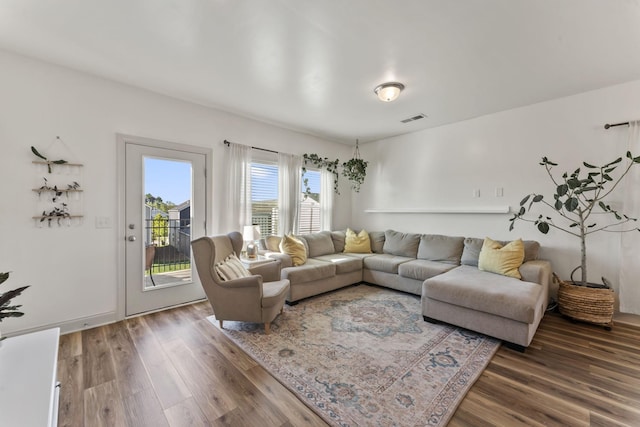 living room featuring dark hardwood / wood-style floors