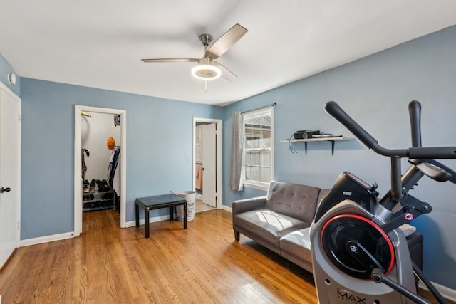 interior space with ceiling fan and light hardwood / wood-style flooring