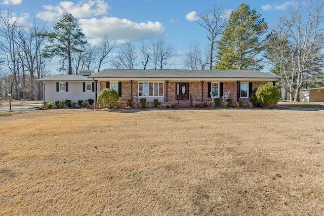 single story home with a front yard