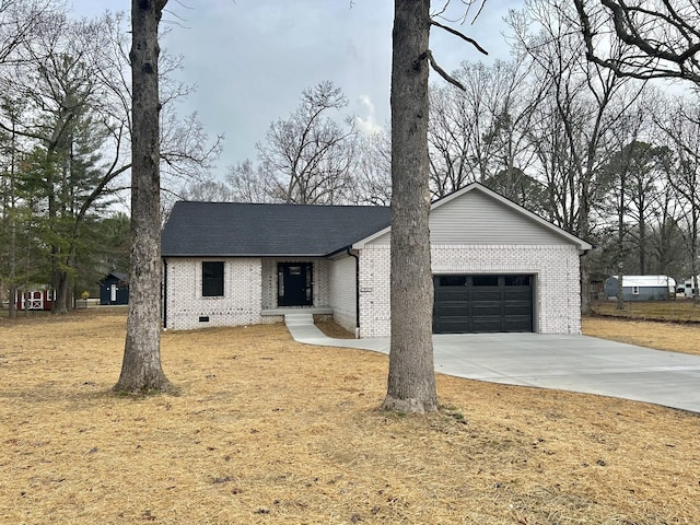 single story home with brick siding, a garage, driveway, and a shingled roof