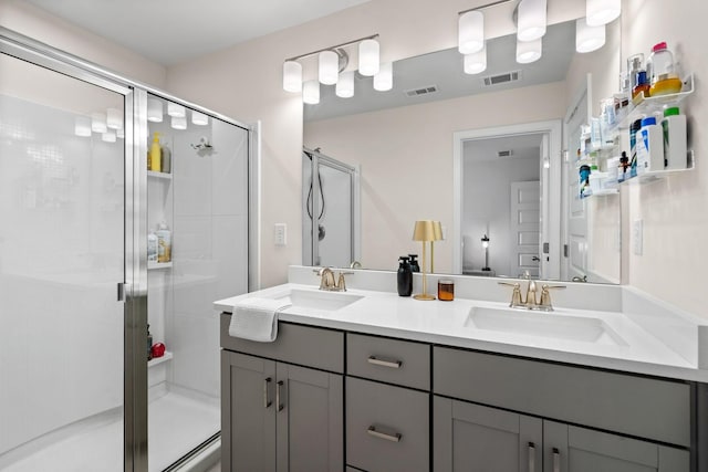 bathroom with vanity and walk in shower