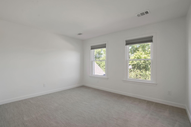 empty room featuring carpet flooring