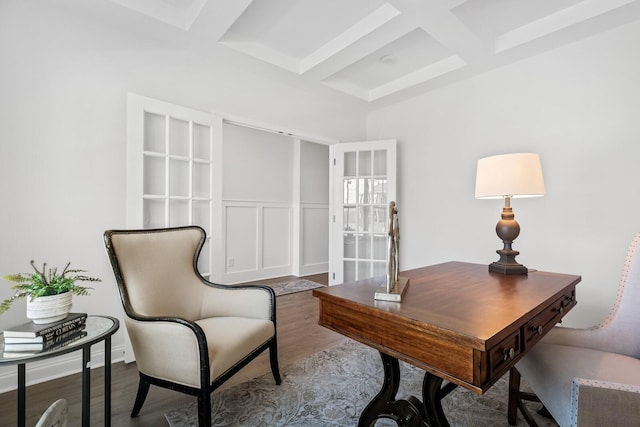 office featuring hardwood / wood-style flooring, coffered ceiling, and beam ceiling