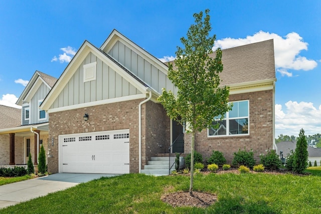 view of front of property with a garage and a front yard