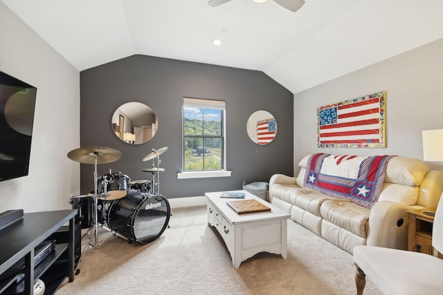 carpeted living room with vaulted ceiling and ceiling fan