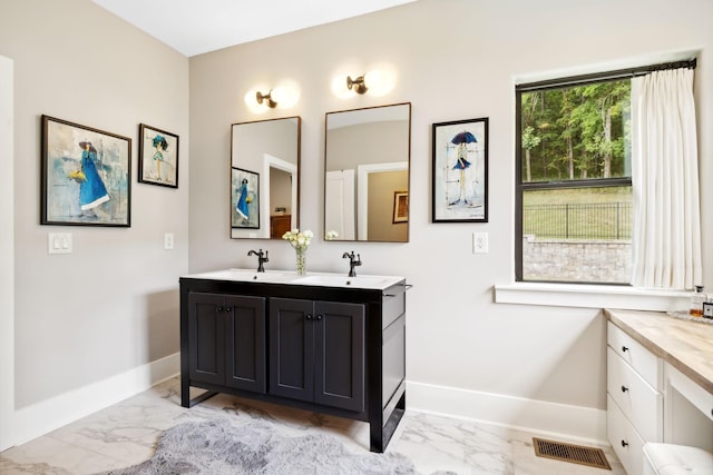 bathroom featuring vanity