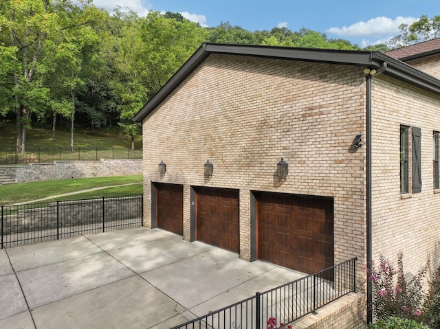 view of home's exterior with a garage