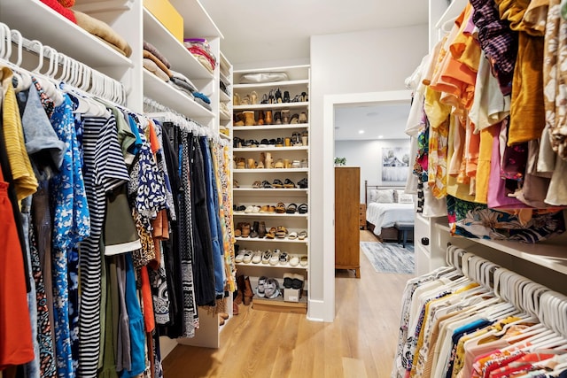 walk in closet featuring light hardwood / wood-style floors