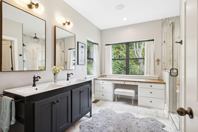 bathroom featuring vanity and walk in shower