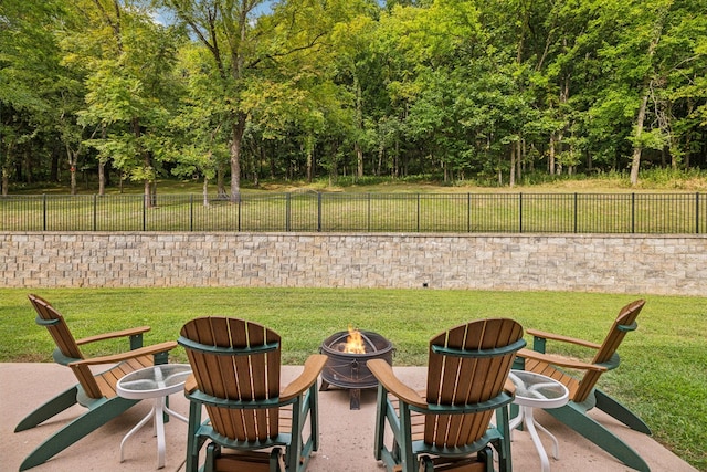 view of patio featuring a fire pit