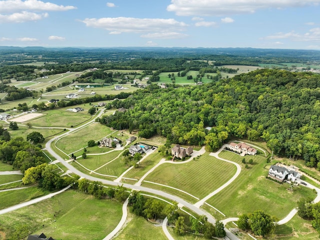 birds eye view of property featuring a rural view