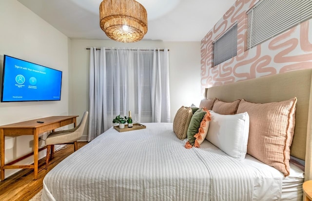 bedroom featuring hardwood / wood-style flooring