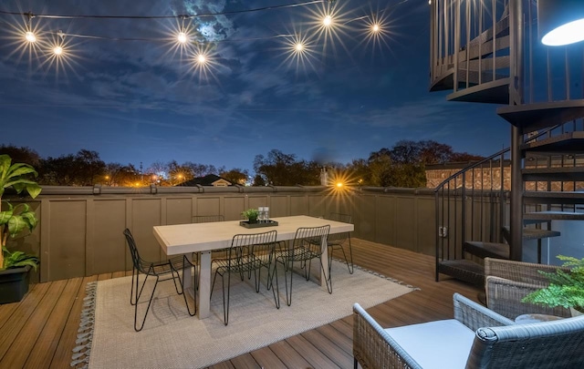 view of deck at twilight