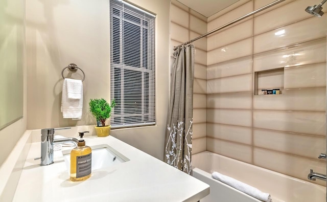 bathroom with vanity and shower / tub combo