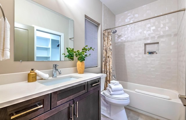 full bathroom featuring shower / bathtub combination with curtain, vanity, and toilet