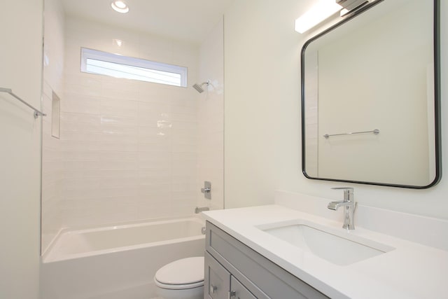 full bathroom featuring vanity,  shower combination, and toilet