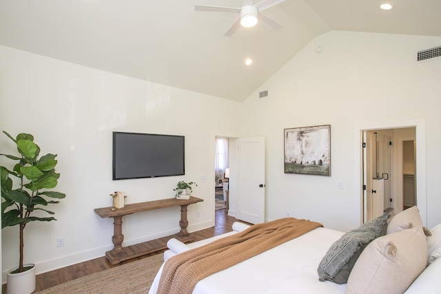 bedroom with high vaulted ceiling, dark hardwood / wood-style floors, and ceiling fan