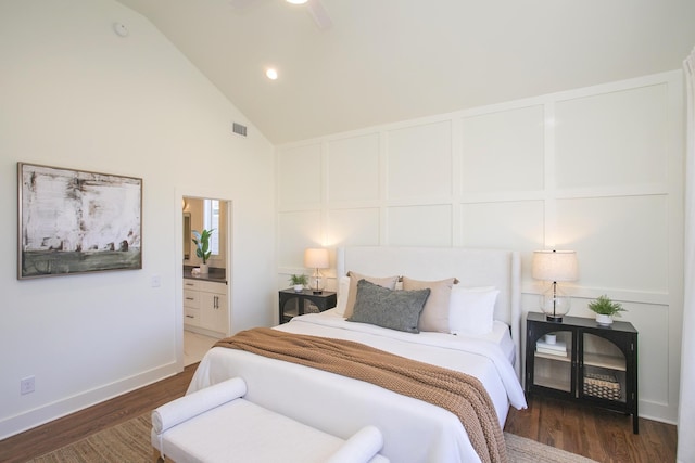 bedroom featuring connected bathroom, high vaulted ceiling, dark hardwood / wood-style floors, and ceiling fan