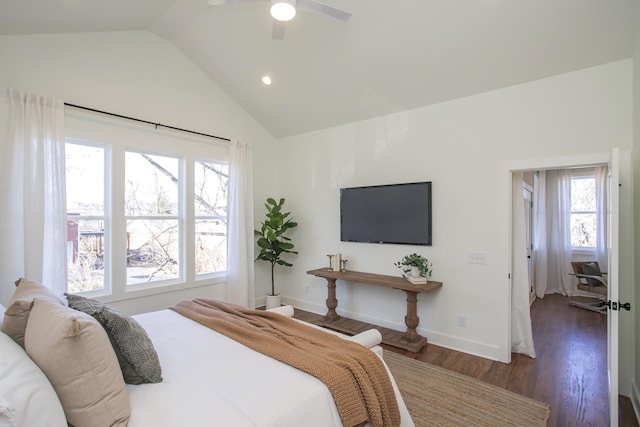 bedroom featuring dark wood-type flooring, ceiling fan, and lofted ceiling